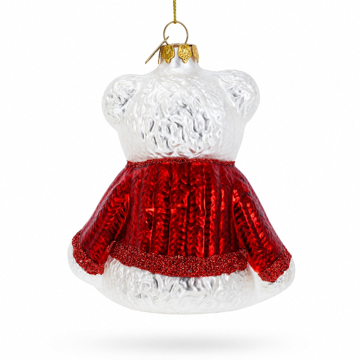 White teddy bear glass ornament in a red knit sweater, front view with gold hanging hook