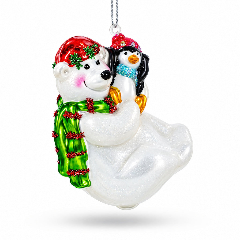Glass Christmas ornament polar bear and penguin, red cap, silver chain, bow scarf