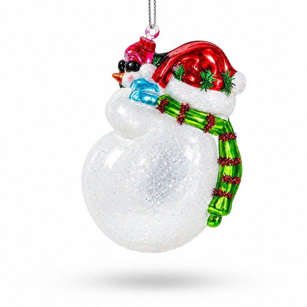 Glass Christmas ornament glitter polar bear holding penguin, red cap, silver chain