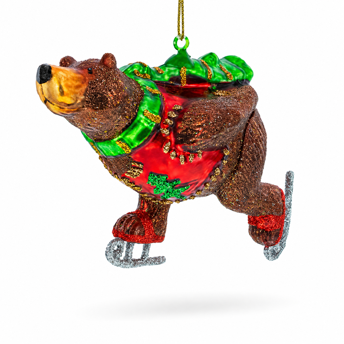 Skating bear glass ornament: brown bear on ice skates, green jacket, red scarf