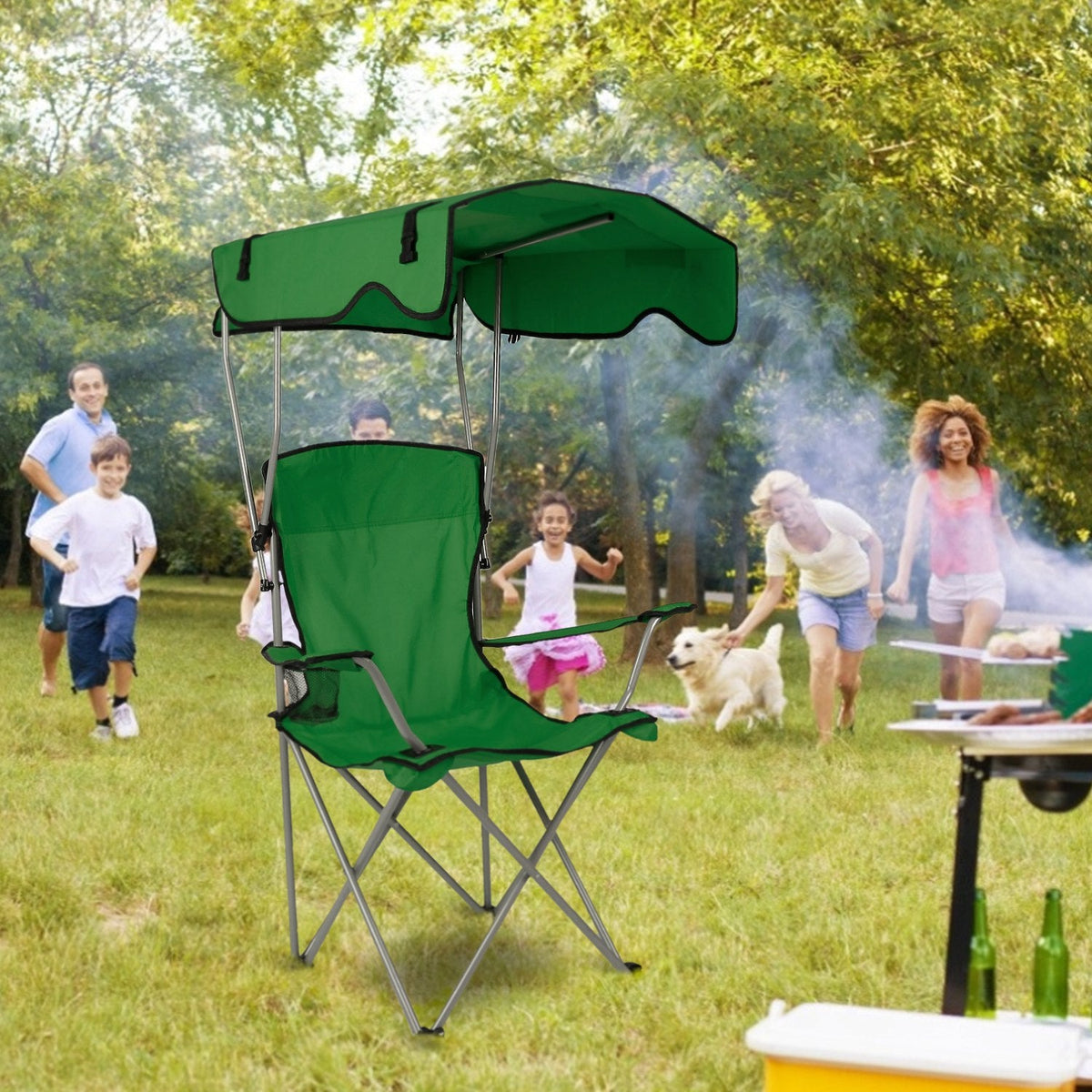 Folding canopy beach chair in green with mesh side panel and padded seat