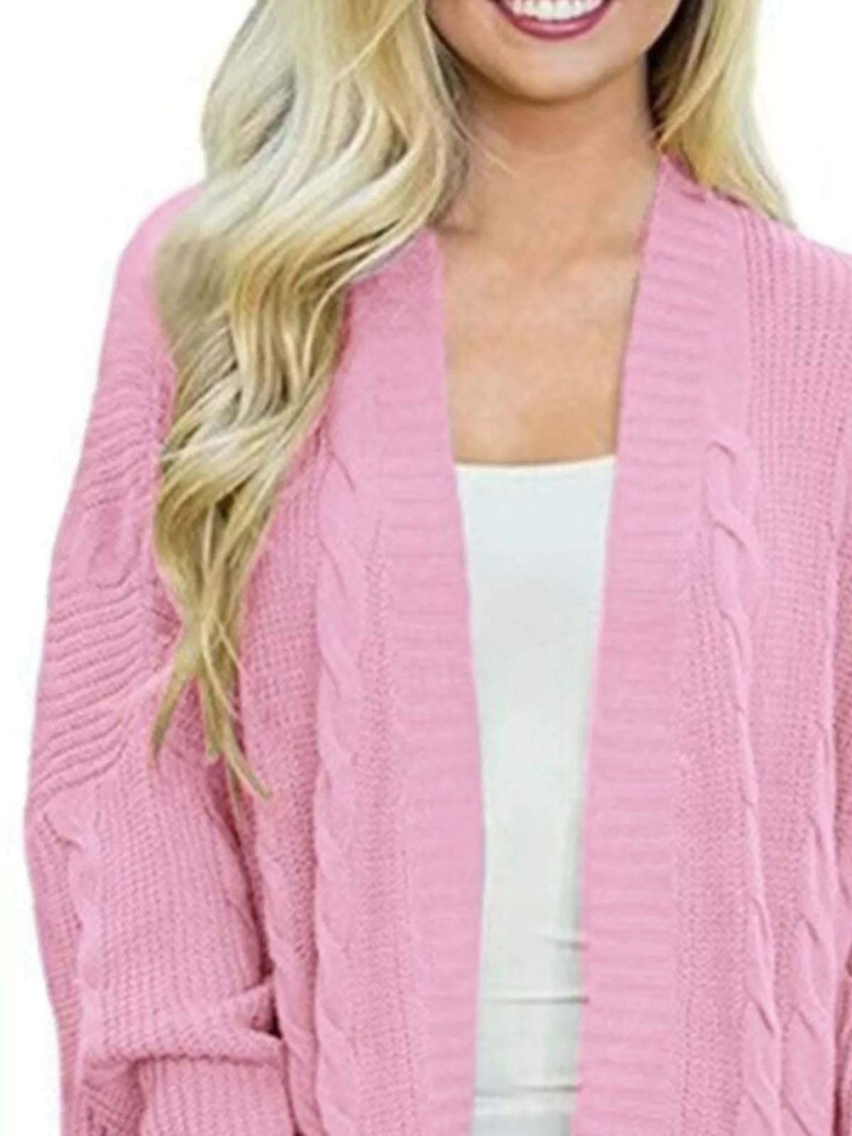 Plus-size chunky knit open-front cardigan, dusty pink with cable knit texture at shoulders.