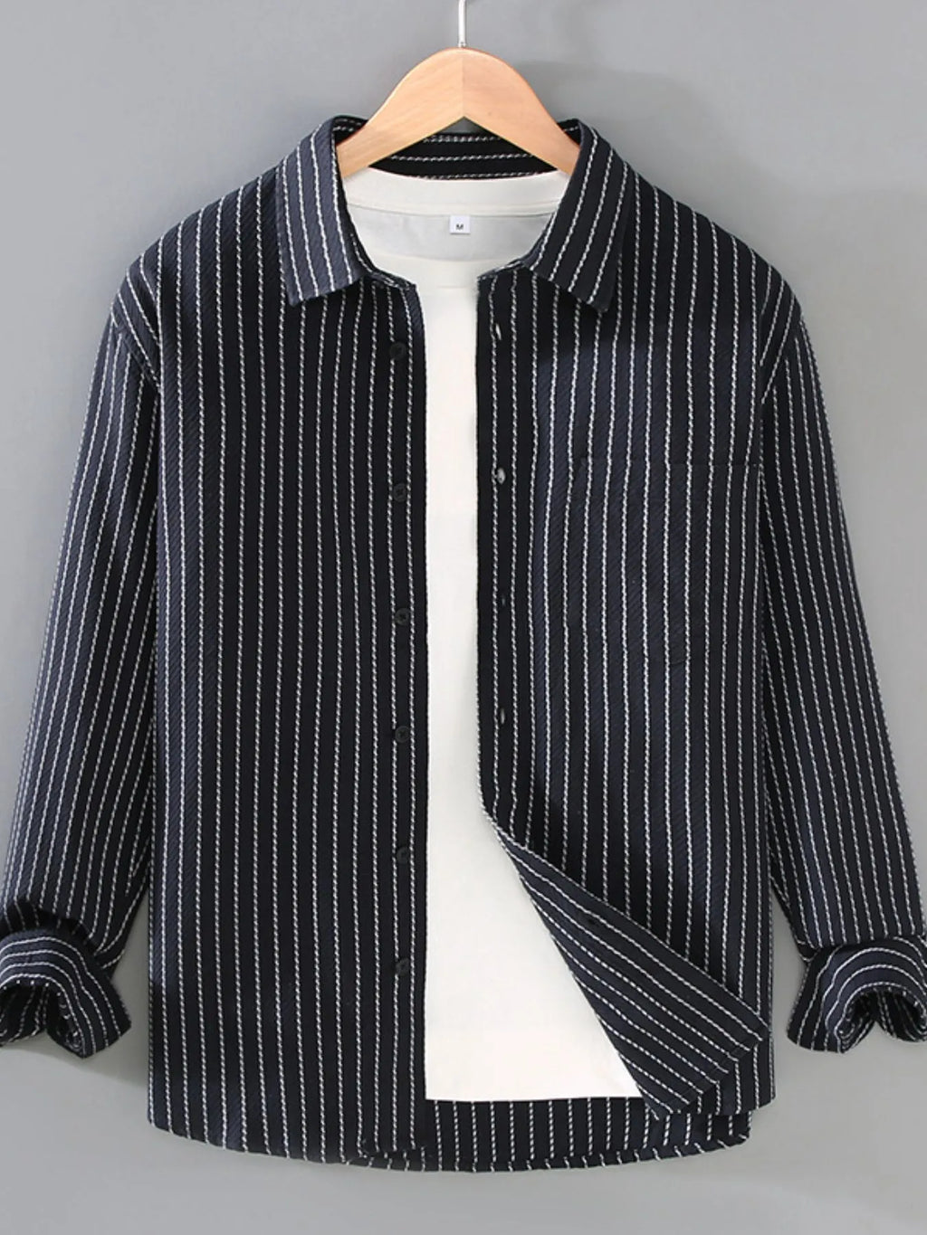 Black striped button-up long-sleeve shirt with button placket and point collar