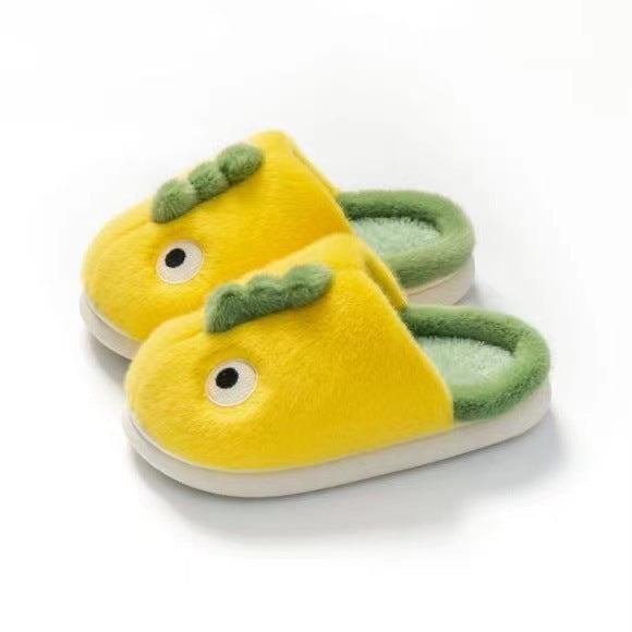 Children’s yellow plush dragon slippers with green horns and embroidered eyes