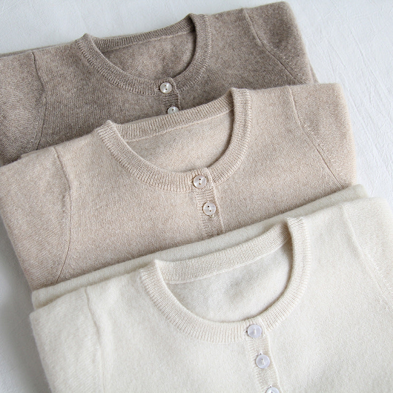 Children's cashmere pajama onesies, button front and long sleeves in taupe and light beige