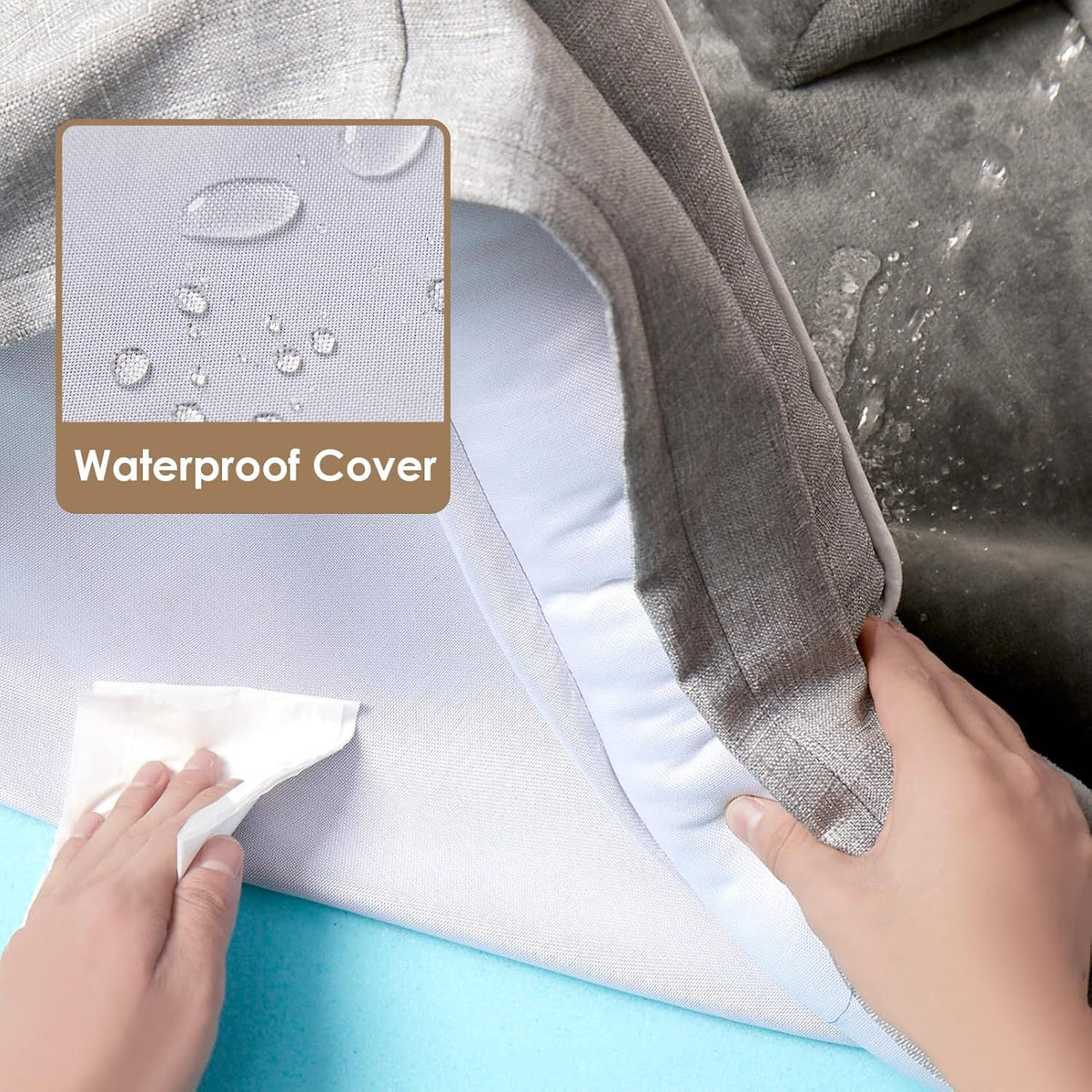 Dog bed with waterproof cover showing water droplets and a hand lifting the fabric corner