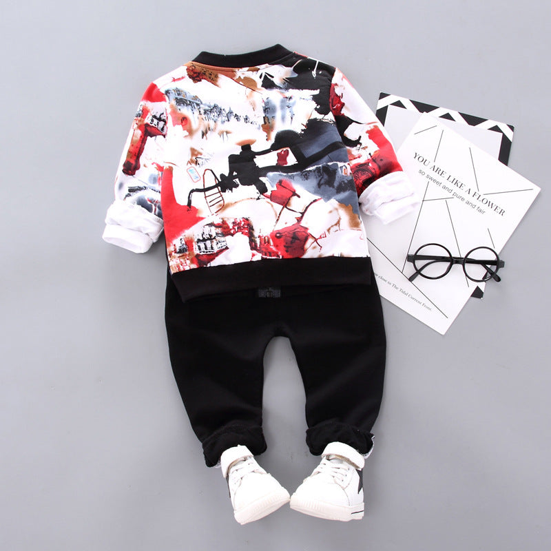 Back view of boys' outfit with printed jacket and black pants