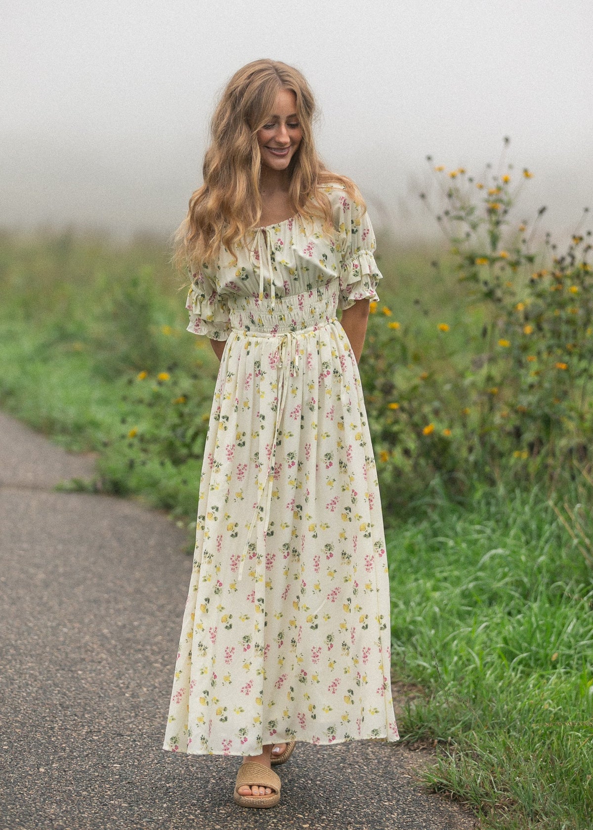 Ivory floral puff-sleeve maxi dress with gathered waist and full skirt