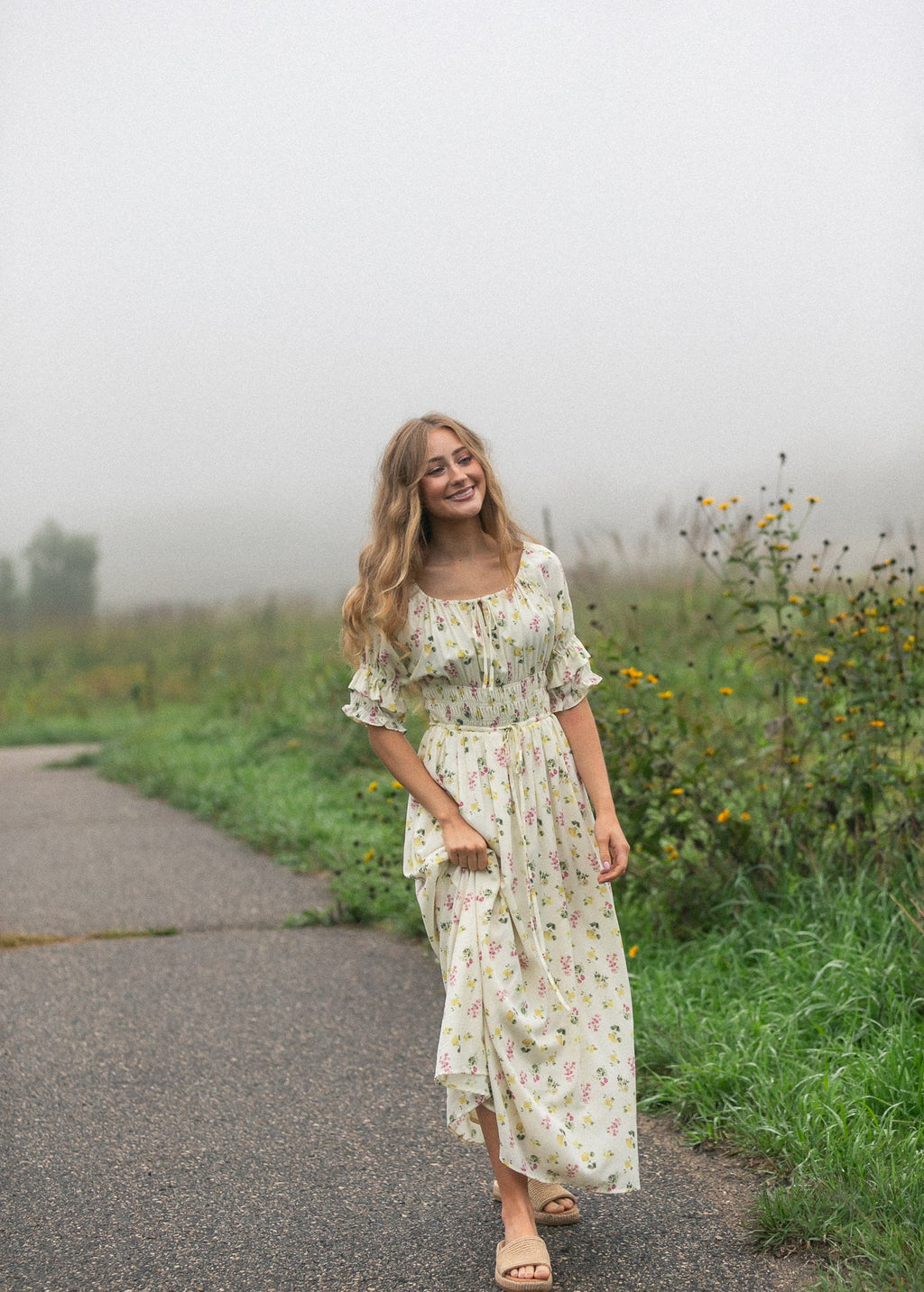 Ivory floral puff-sleeve maxi dress with gathered skirt and round neckline