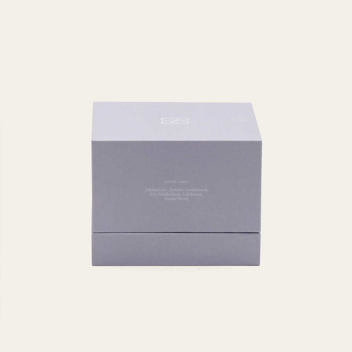 Lilac gift box for Lilac Mist ceramic soy candle, with brand logo on top.