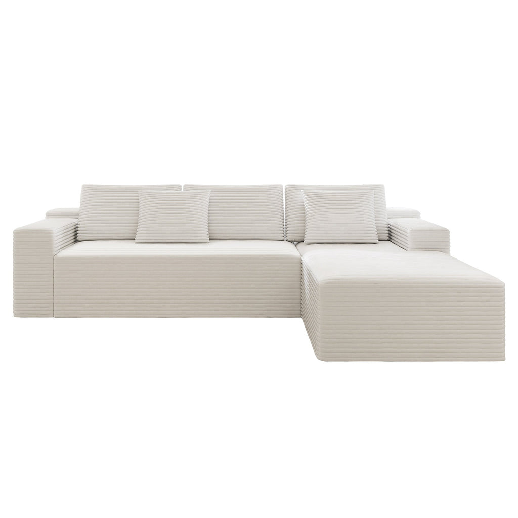 White modular sectional sofa seat with chaise extension and stacked back cushions