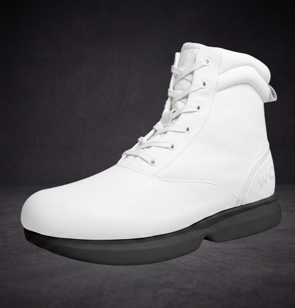 White WOA boot side view with lace-up closure and thick black rubber sole