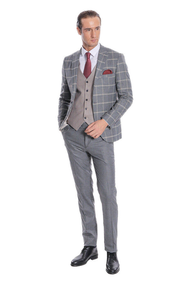 Checked grey three-piece suit with waistcoat and maroon tie, full-body view