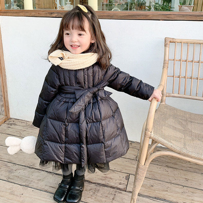 Girls' mid-length winter puffer coat, black, belted waist and fluffy light collar