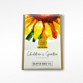 Children's garden seed collection packet with colorful leaf artwork and Seattle Seed Co. label