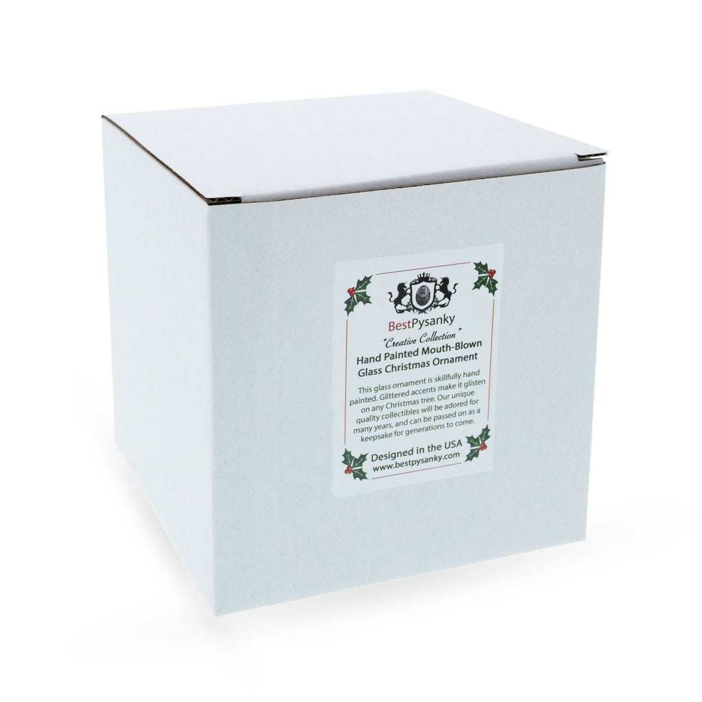 Christmas ornament gift box with festive logo and design label on white packaging.