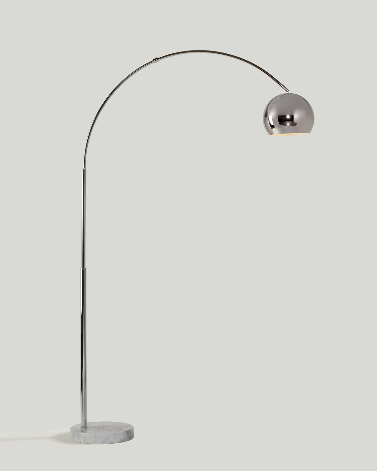 Arc floor lamp with chrome dome shade and round marble-look base
