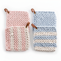 Chunky knit cotton pot holders with textured stitch; pink and blue sets, leather loops