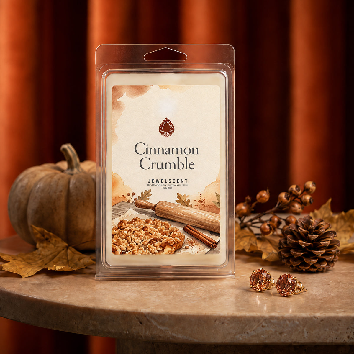 Cinnamon Crumble jewelry wax tart in clear clamshell package with hanging tab