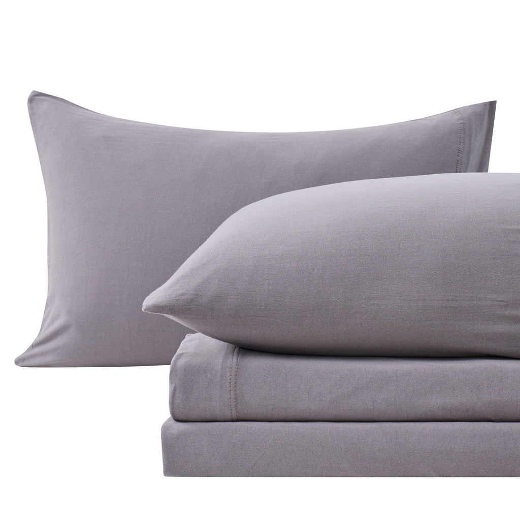 Grey jersey knit sheet set with two pillowcases and folded fitted sheet