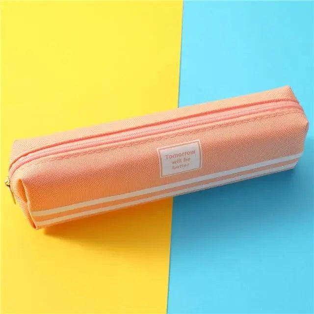 Peach double-zip pencil pouch with textured fabric and centered front label