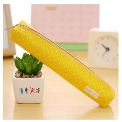 Yellow canvas pencil pouch with white dot pattern and zipper closure