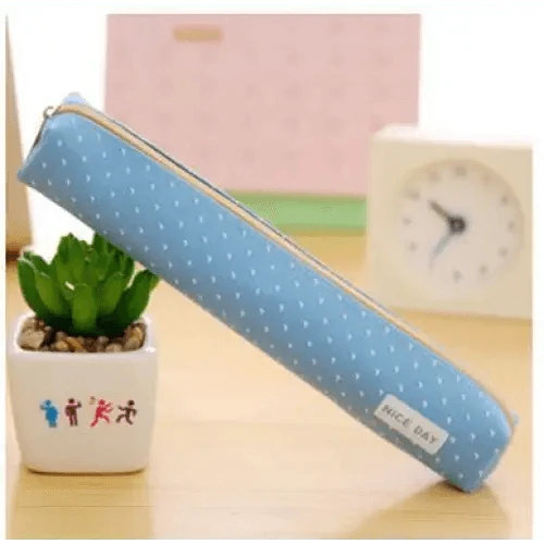 Blue canvas pencil pouch with white dot pattern and zipper closure