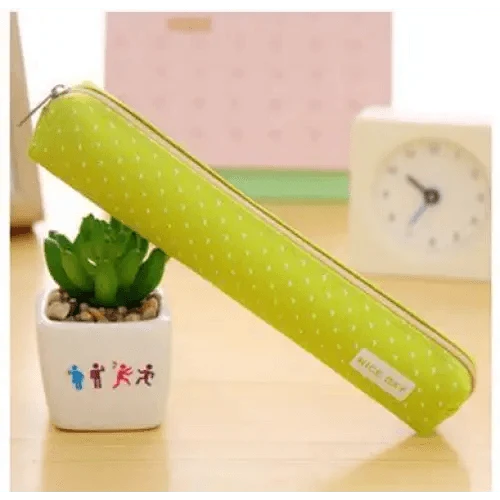 Green dotted slim canvas pencil pouch with zipper and 'Nice day' label.