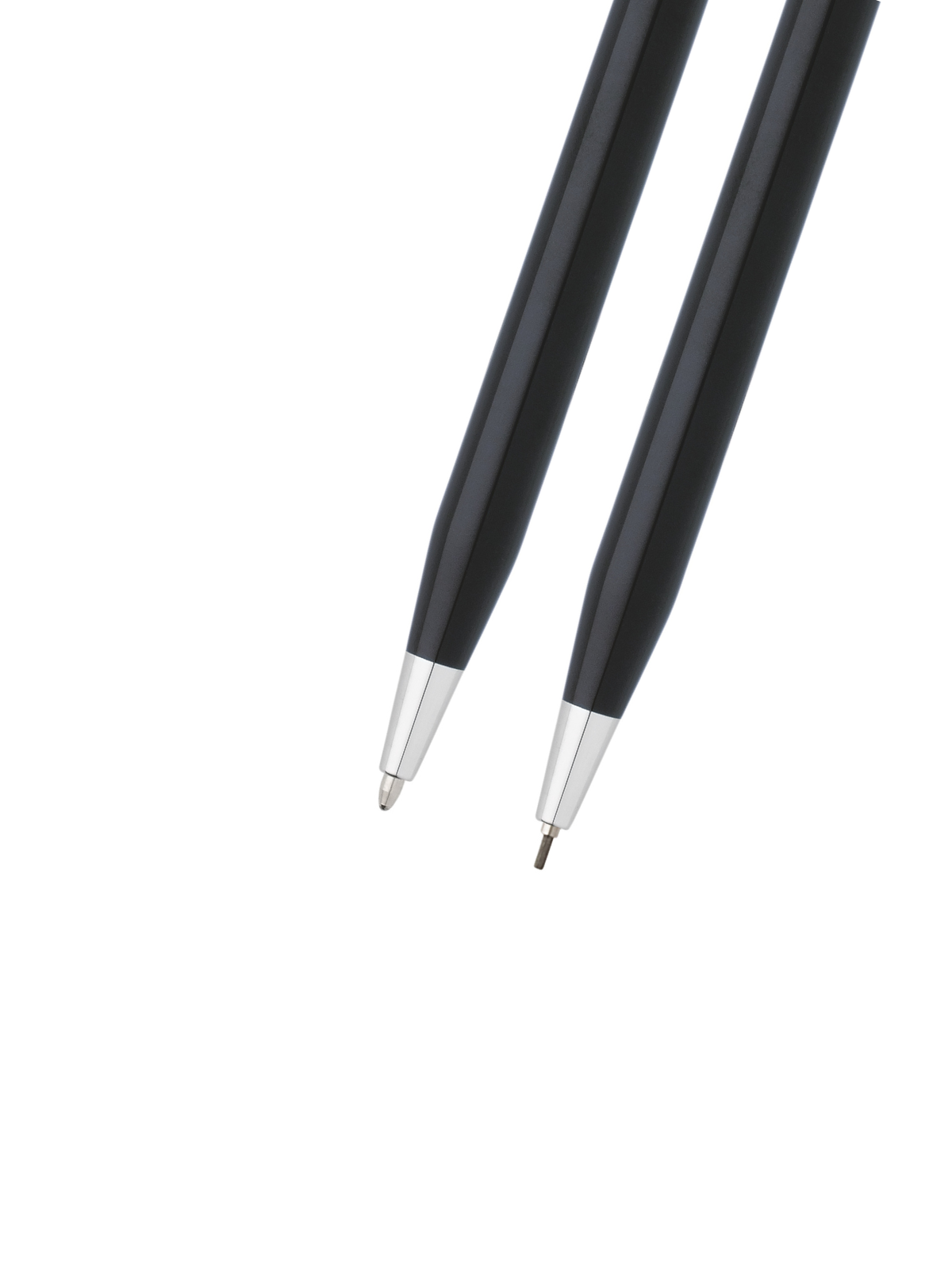 Close view of black lacquer pen tips with silver metal points and white end caps