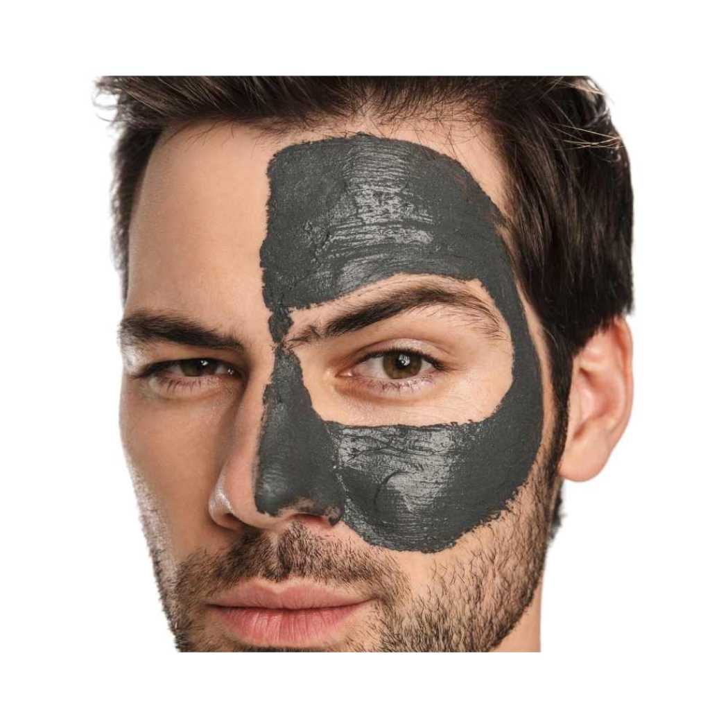 Clay mask stick results: dark charcoal mask covering face contours