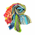 Multicolor sari patchwork scarf with swirling patterns and bright border trim.