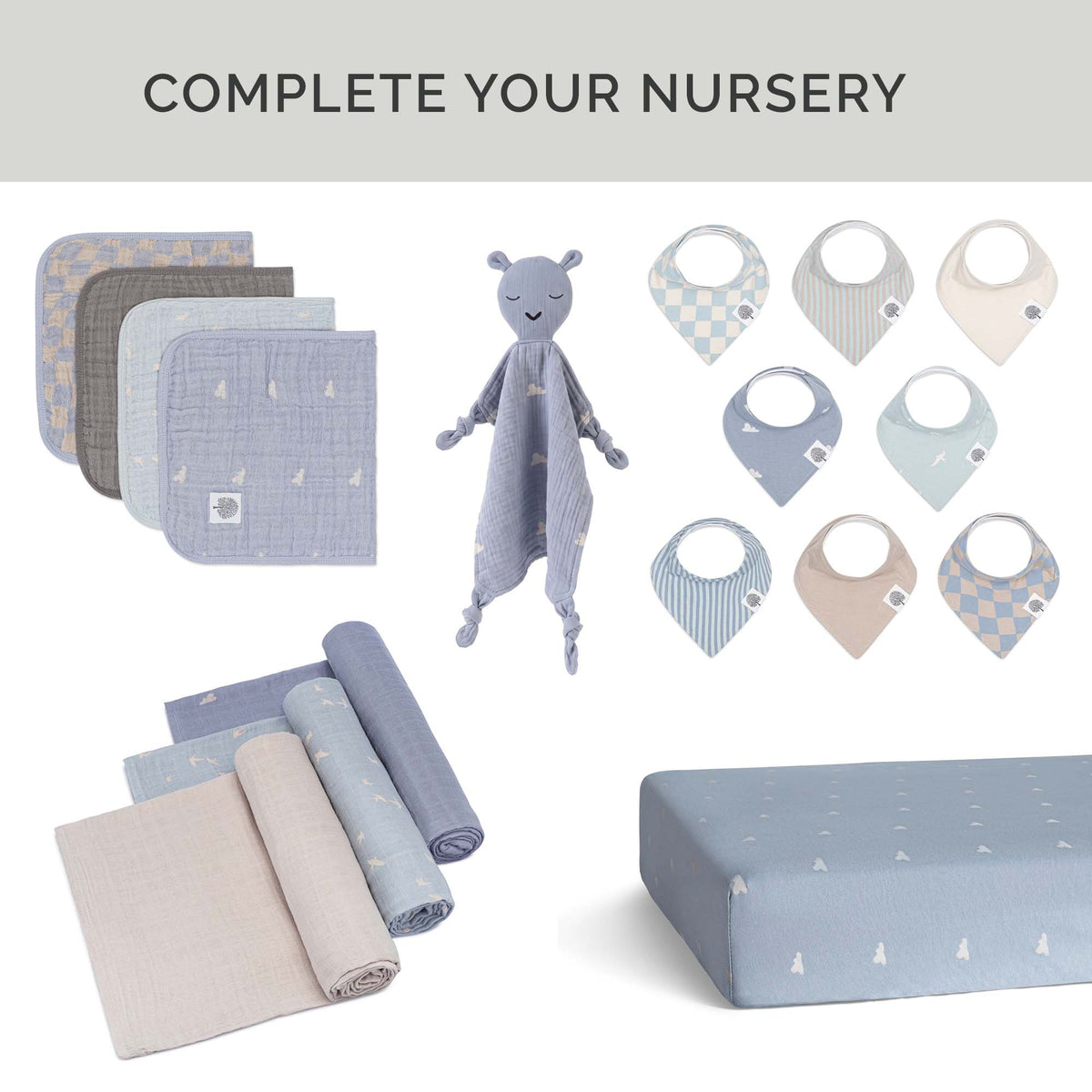 Crib sheet in periwinkle blue with tiny star print, folded with matching textures