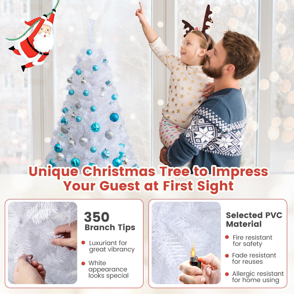 White artificial Christmas tree with blue ornament baubles, front view