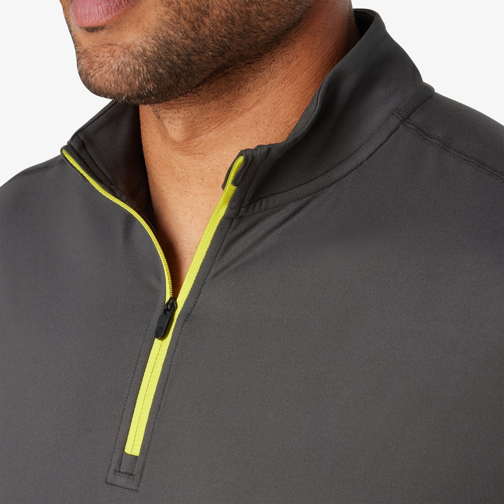 Charcoal quarter-zip collar with neon yellow piping and zipper tab
