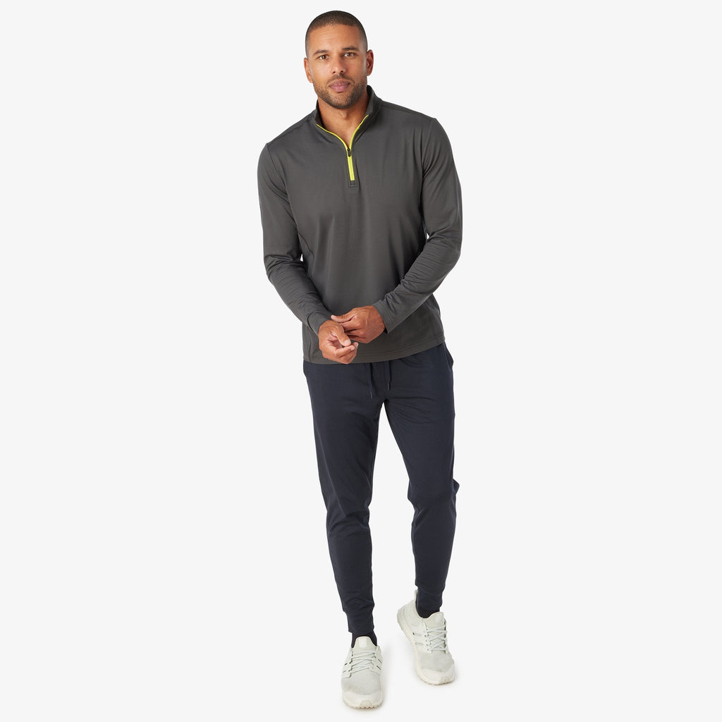 Charcoal quarter-zip tech pullover with neon yellow zipper and long sleeves
