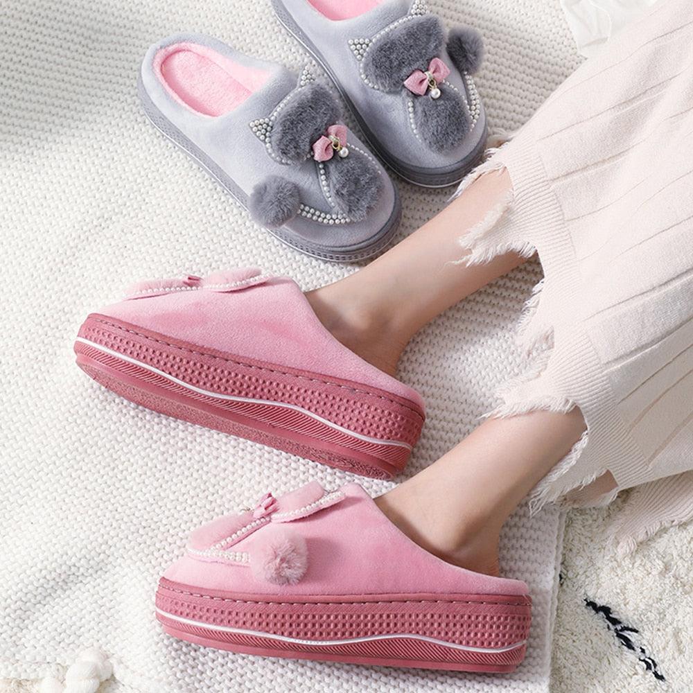 Pink and gray plush cotton indoor slippers with bow, rhinestone trim, and textured outsole