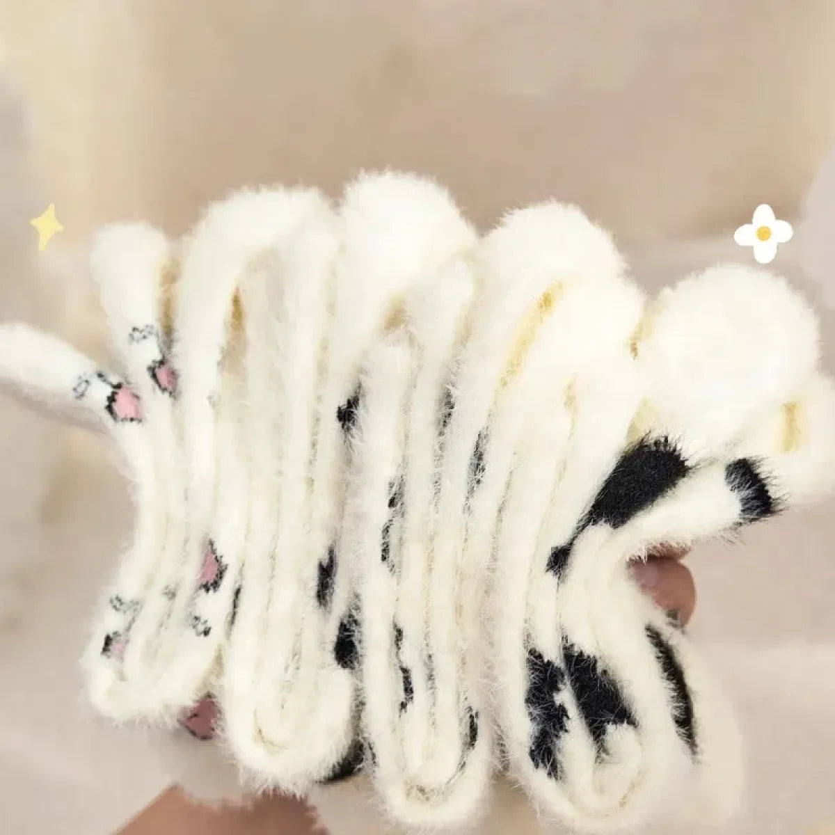 Women’s cow mink velvet socks, plush white with black cow patches and striped knit look