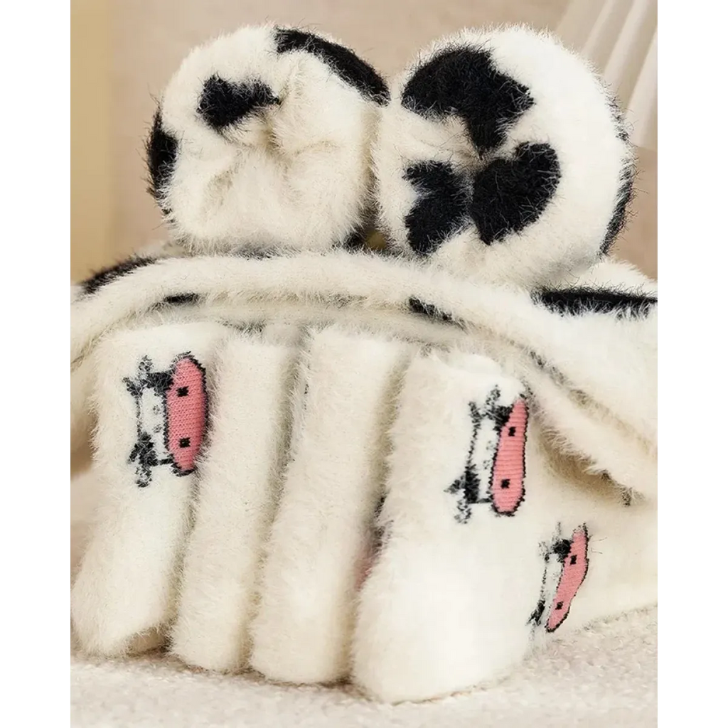 Women’s cow mink velvet socks, plush white with black heart-like cow patches and pink accents