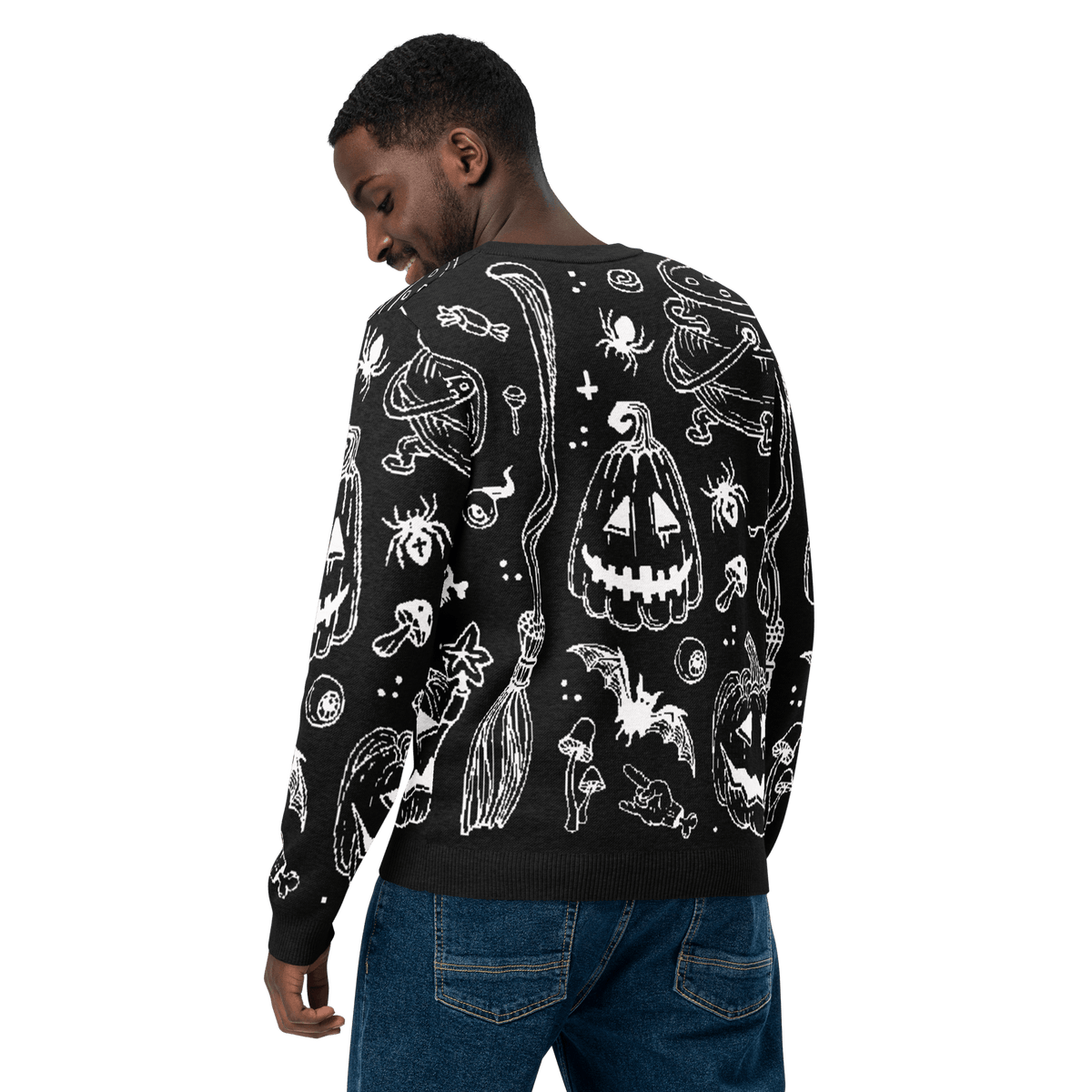 Black crewneck knit sweater with white Halloween character print on the back, long sleeves