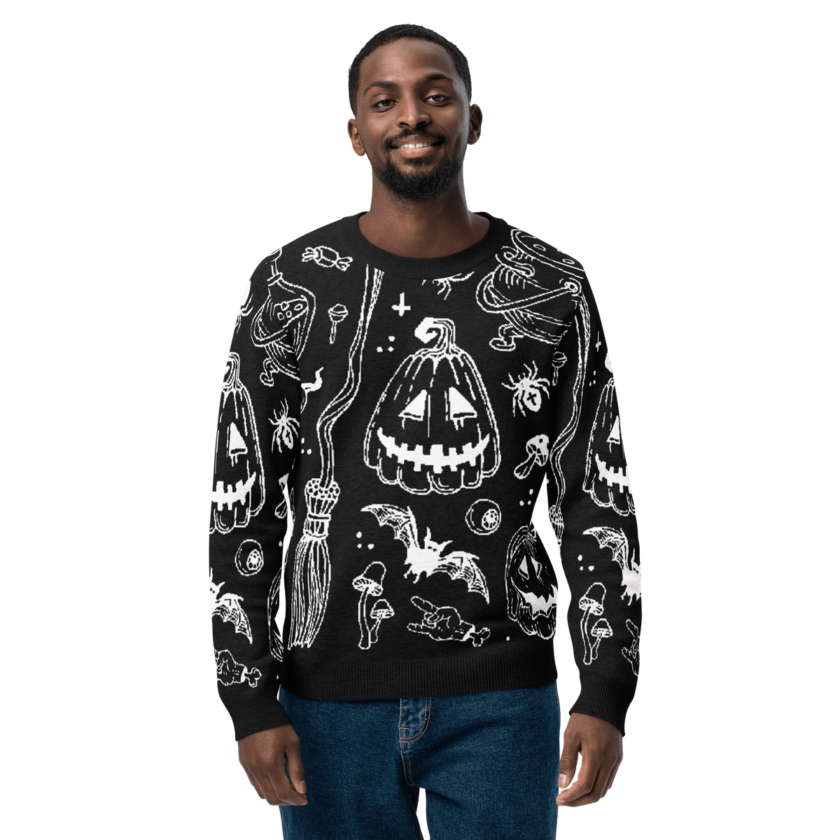 Black knit crewneck sweater with white Halloween-style icons, long sleeves