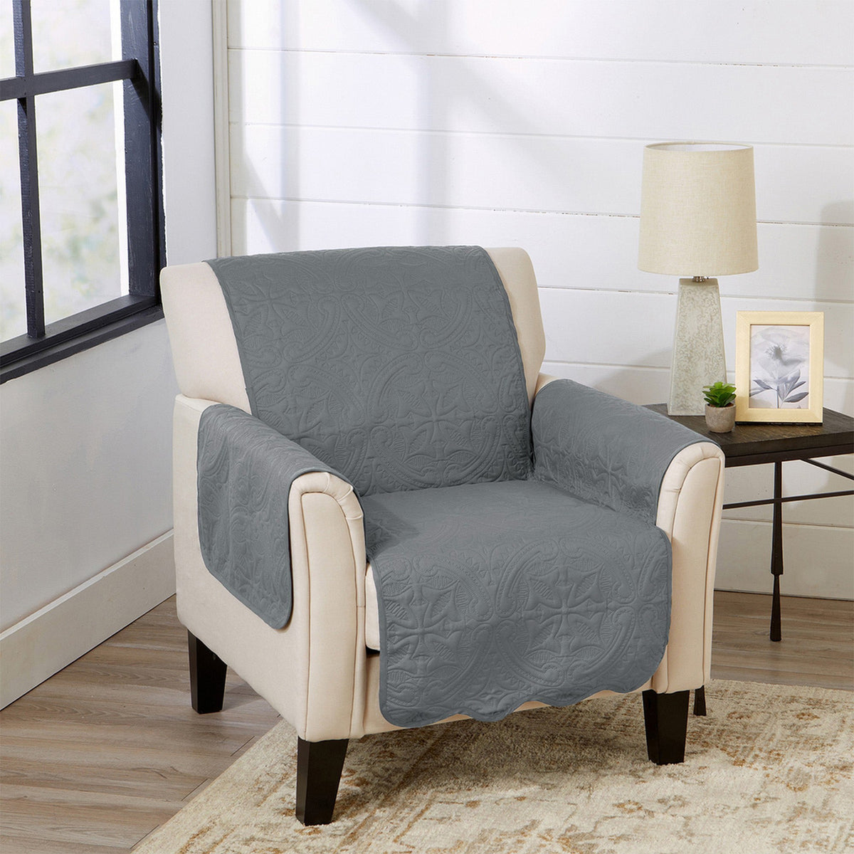 Armchair furniture protector in blue-gray with quilted floral pattern and ivory trim