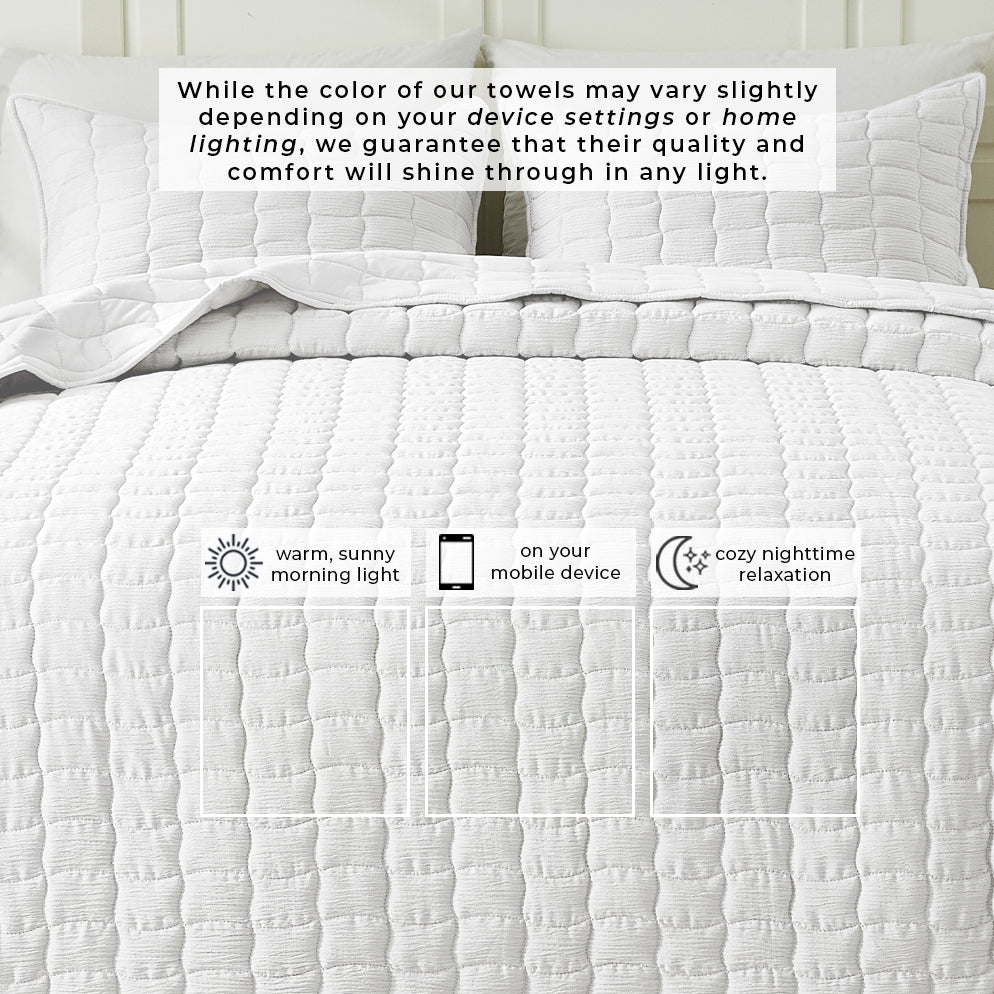 White gauze quilt set top view, wave-stitch quilting with soft textured rows