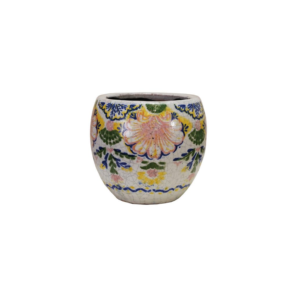 Terracotta round planter with crackle glaze floral motif in blue, yellow, and orange