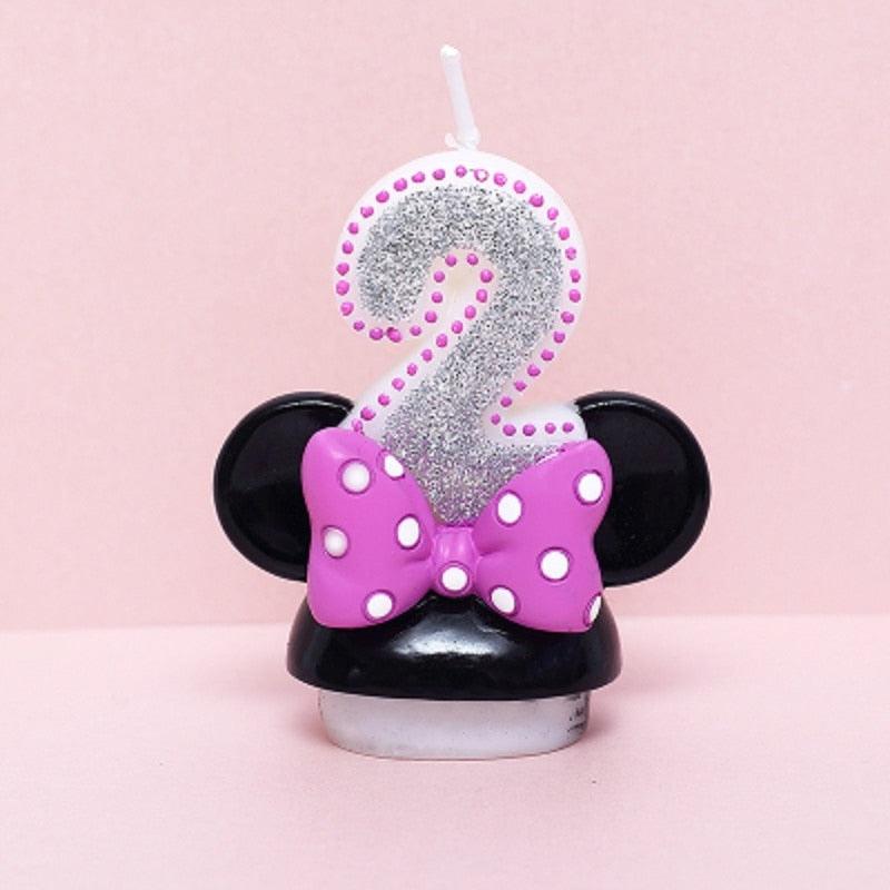 Birthday numeral cake candle '2' with silver glitter, pink bow, and black ear sides