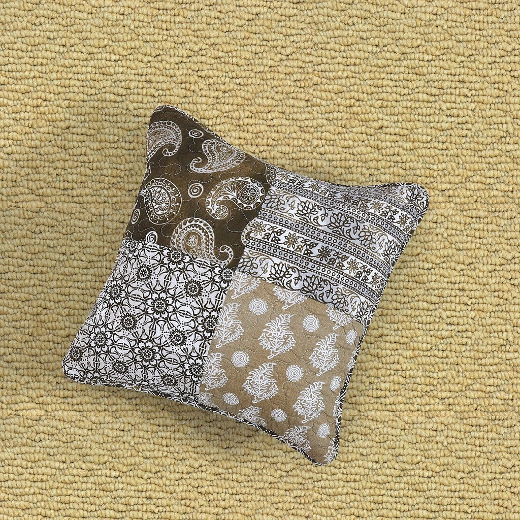 Bohemian throw pillow cover with paisley, geometric blocks, and white polka dots on dark brown
