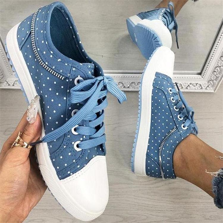 Women’s light blue lace-up platform sneakers with white toe and dotted uppers