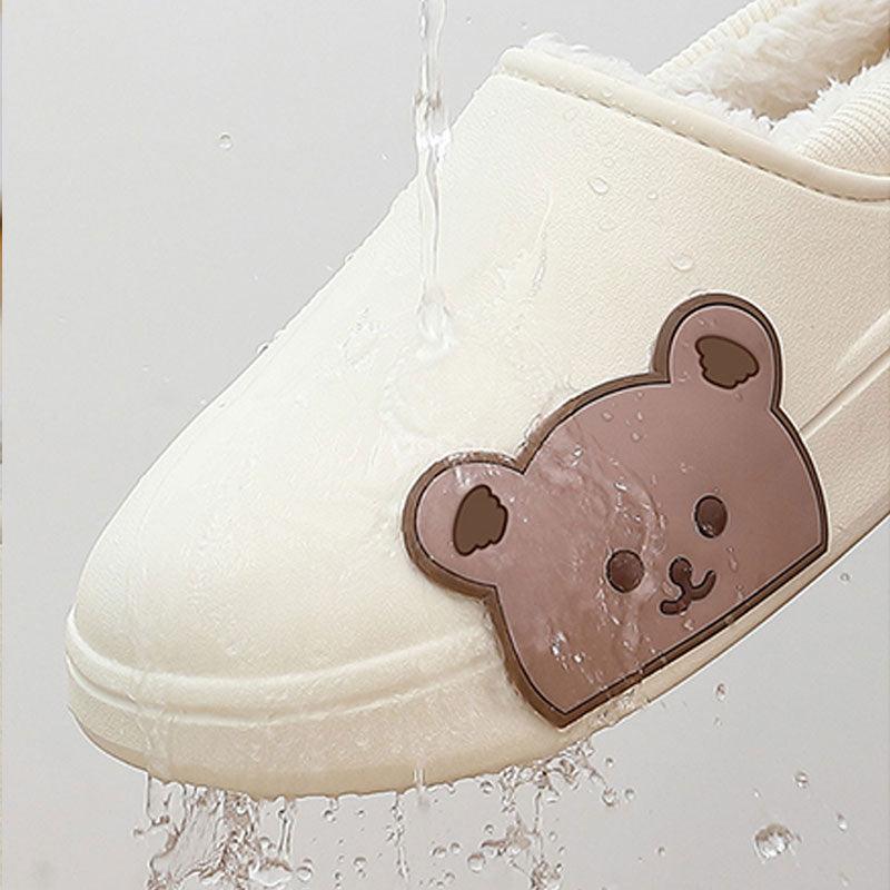 White waterproof slippers with bear face patch and plush inner lining