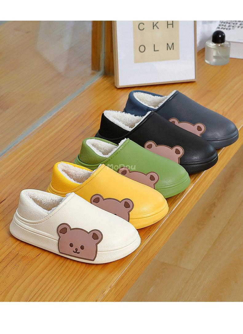 Set of cushioned slip-on slippers with bear face patches, in assorted colors