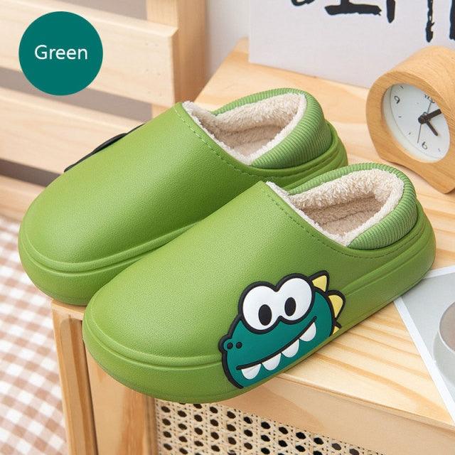 Green women's slip-on slippers with plush lining and cartoon crocodile side graphic