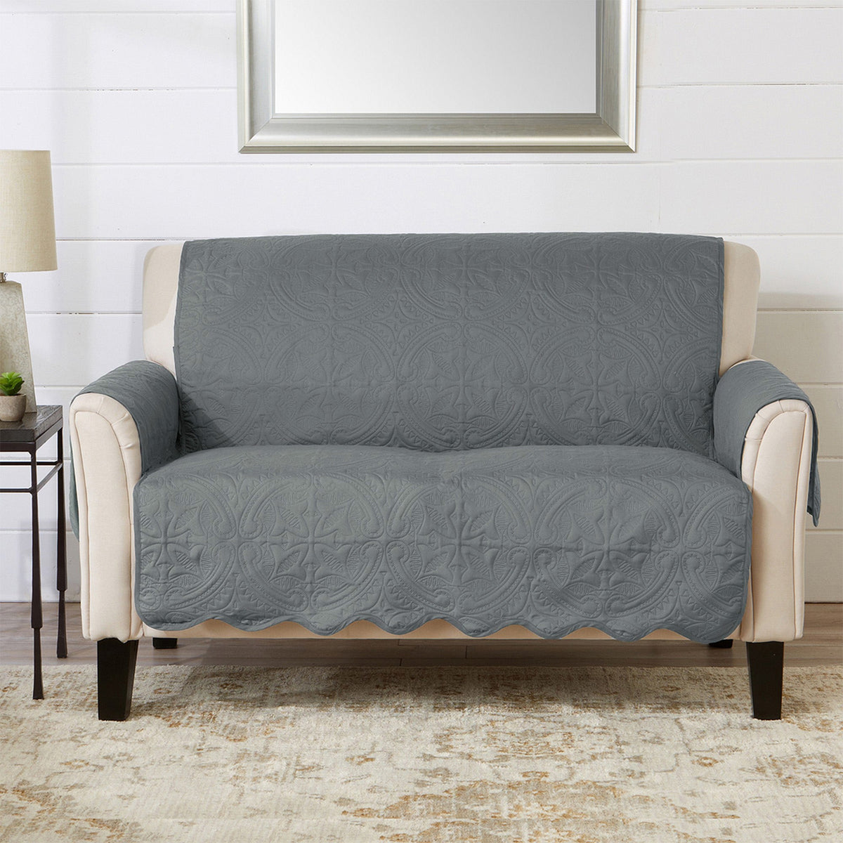 Smoke blue loveseat protector with embossed medallion pattern and fitted seat cover